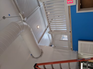 mezzanine from downstairs with finished HVAC trim